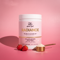 radiance collagen tub on rose studio backdrop with strawberries and gold scoop