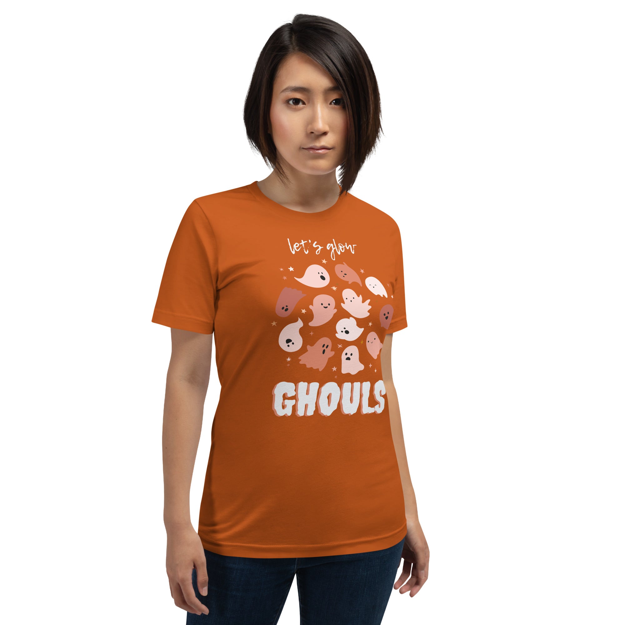 Woman wearing the burnt orange Let's Glow Ghouls Tee